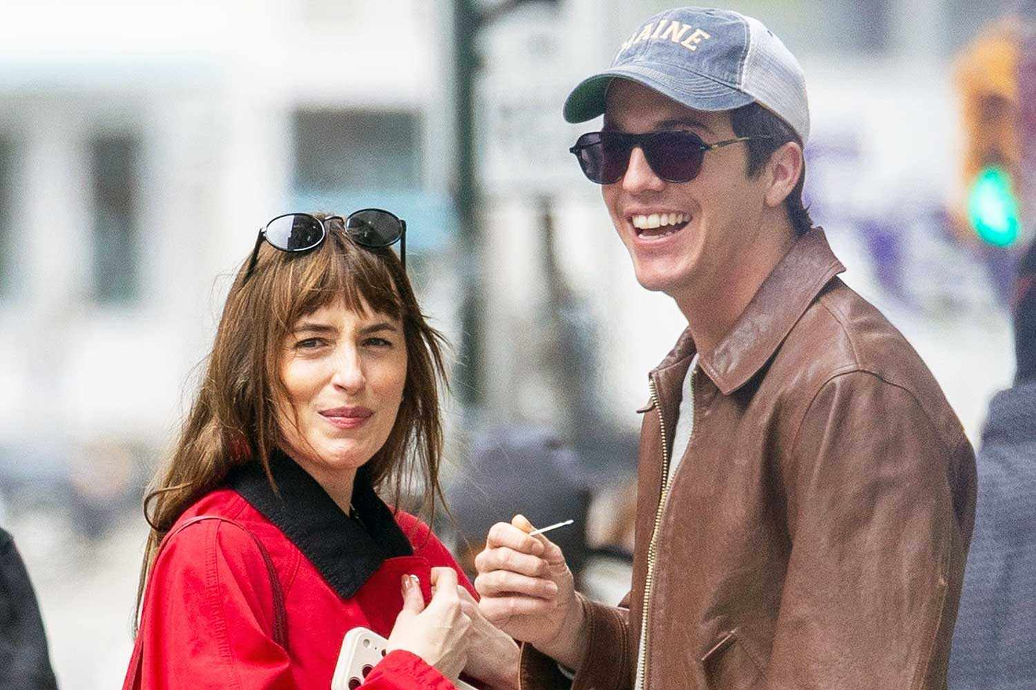 Dakota Johnson Locks Arms with Role Model in NYC — Their Romance Is Heating Up